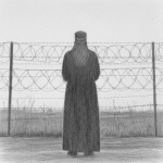 Sketch of an imprisoned priest, looking out beyond the barbed wire fence that detains him.